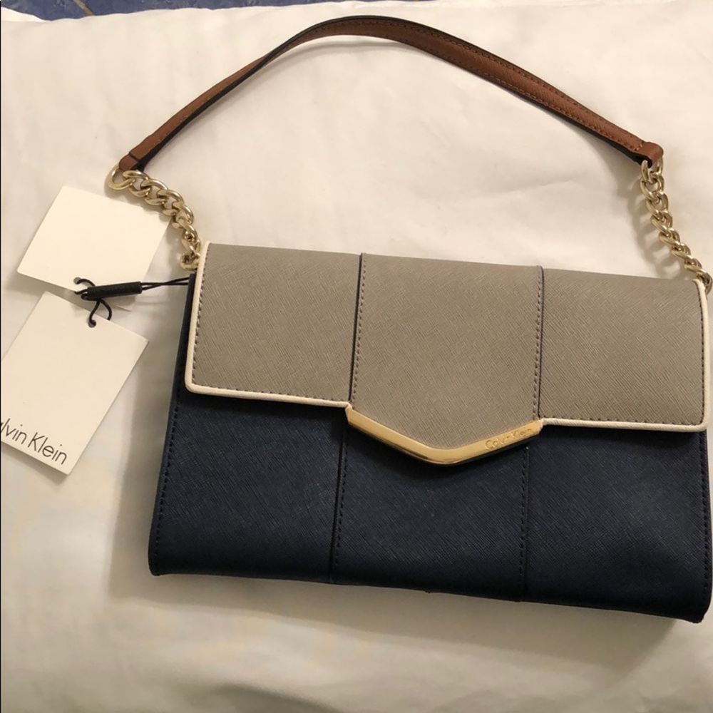 Calvin Klein NWT leather clutch w/optional strap